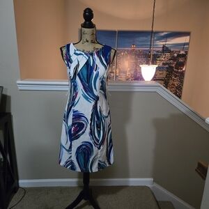 Sleeveless White Dress with Blue and Purple Swirl Design